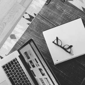 laptop, notebook and eyeglass